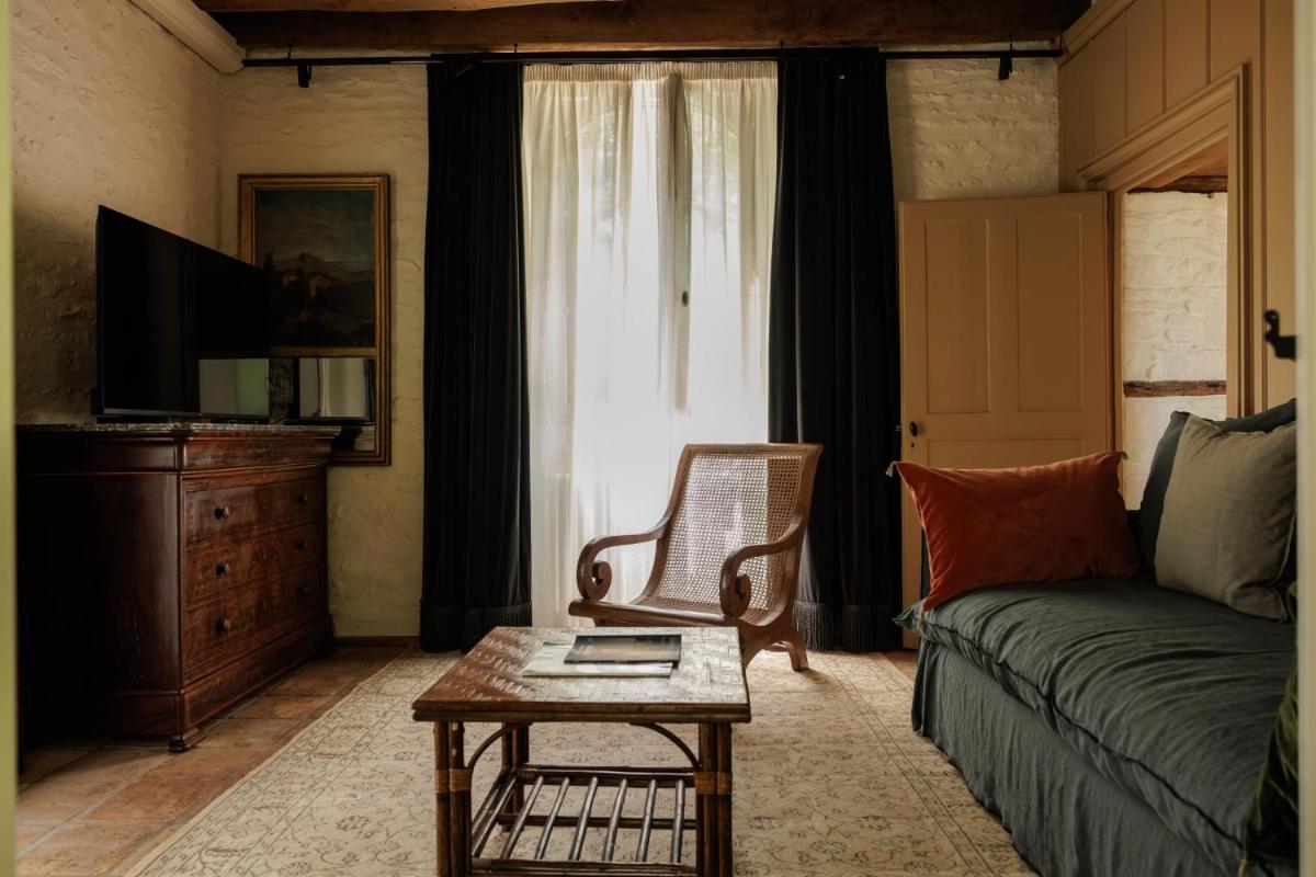 Télévision ou salle de divertissement dans l'établissement Domaine de Locguénolé & Spa - Relais & Chateaux