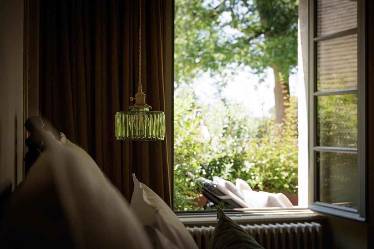 Coin salon dans l'établissement Domaine de Locguénolé & Spa - Relais & Chateaux