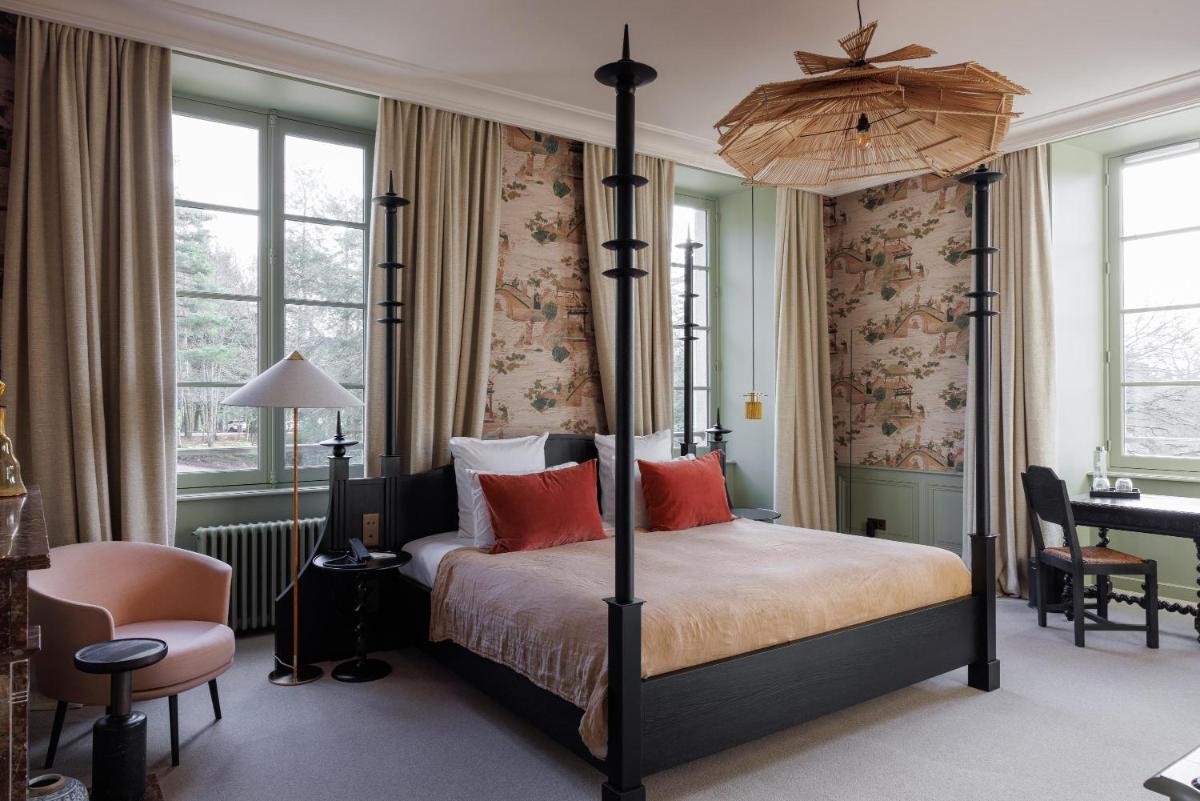 Un ou plusieurs lits dans un hébergement de l'établissement Domaine de Locguénolé & Spa - Relais & Chateaux