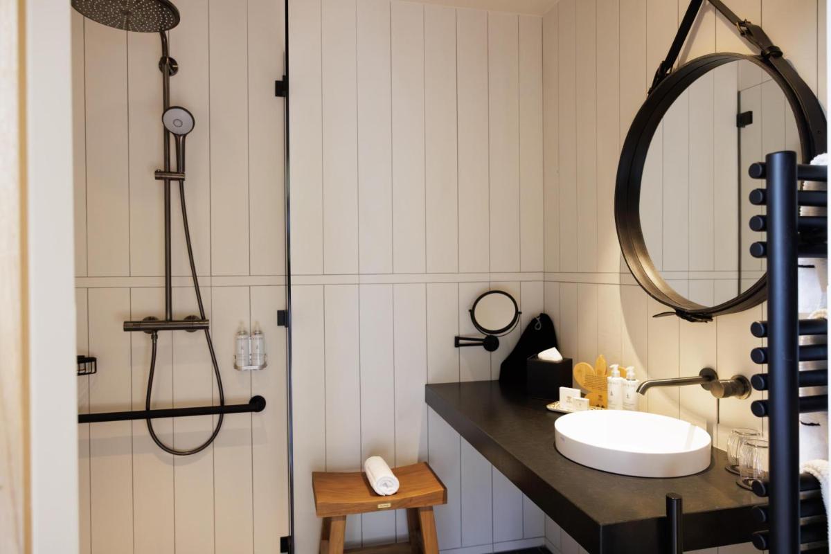Salle de bains dans l'établissement Domaine de Locguénolé & Spa - Relais & Chateaux