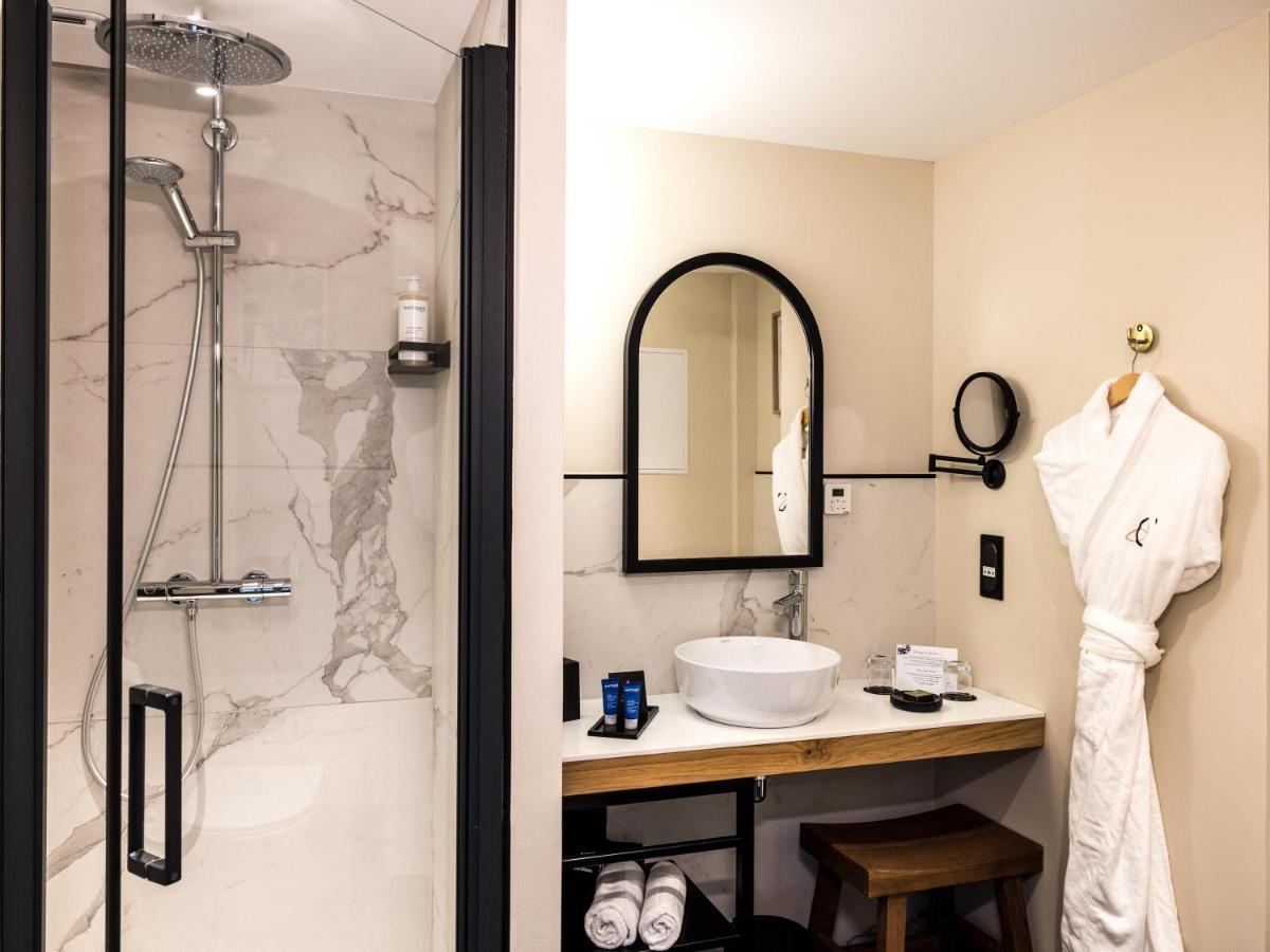 Salle de bains dans l'établissement Le Celtique & Spa