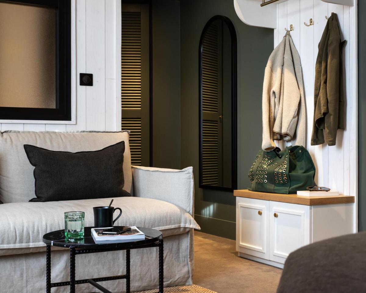 Coin salon dans l'établissement Le Celtique & Spa