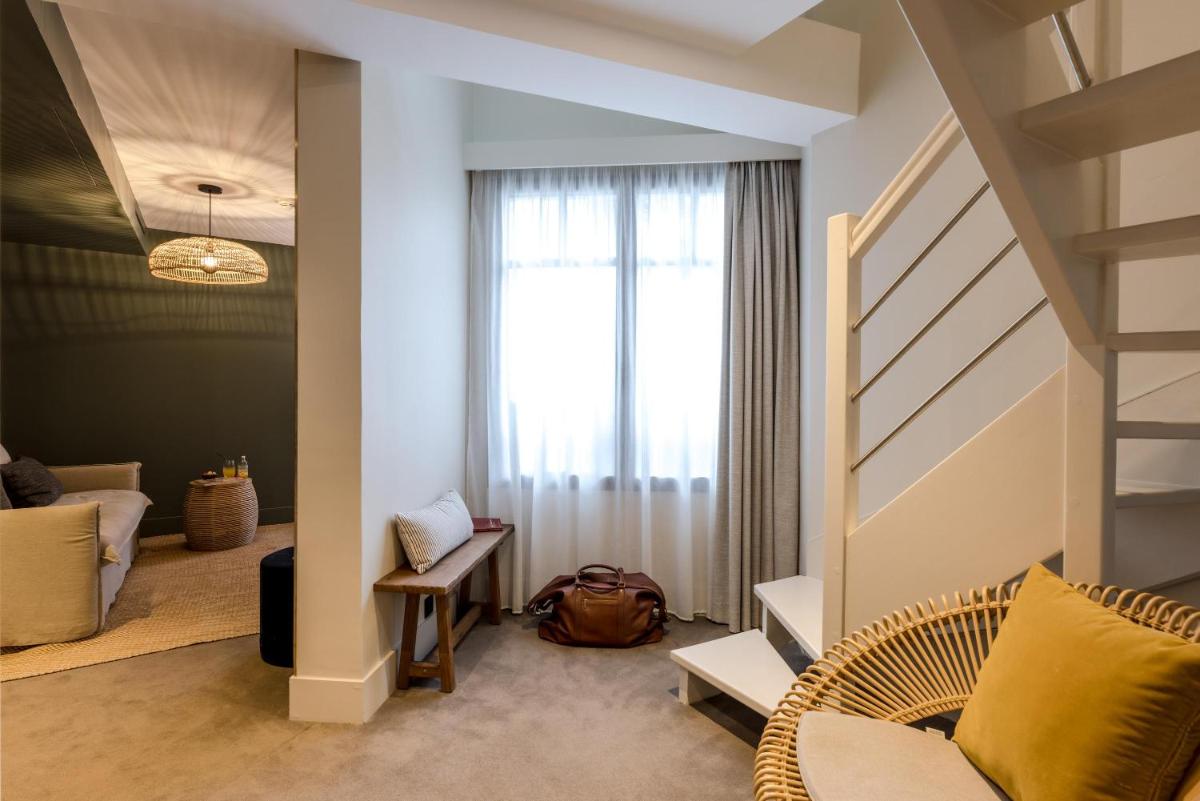 Coin salon dans l'établissement Le Celtique & Spa