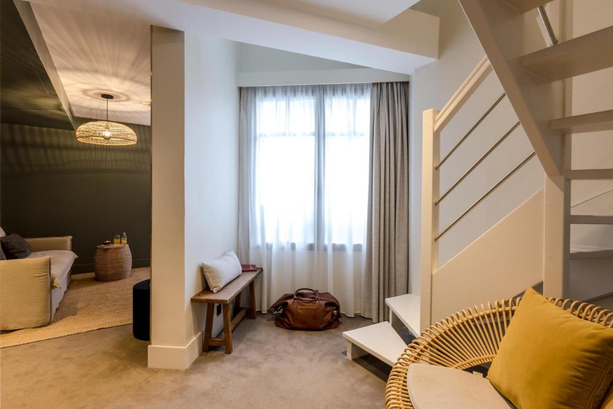 Coin salon dans l'établissement Le Celtique & Spa