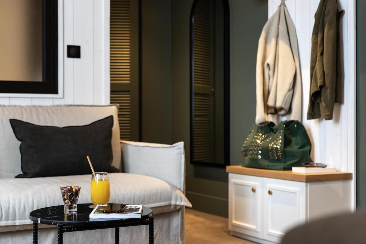 Coin salon dans l'établissement Le Celtique & Spa
