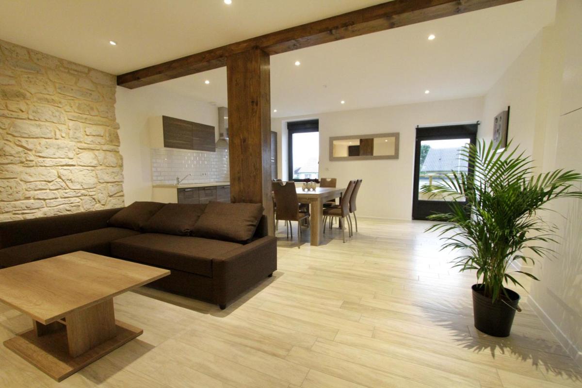 Coin salon dans l'établissement Le Moulin d'Oscar & Spa - Mulhouse Nord