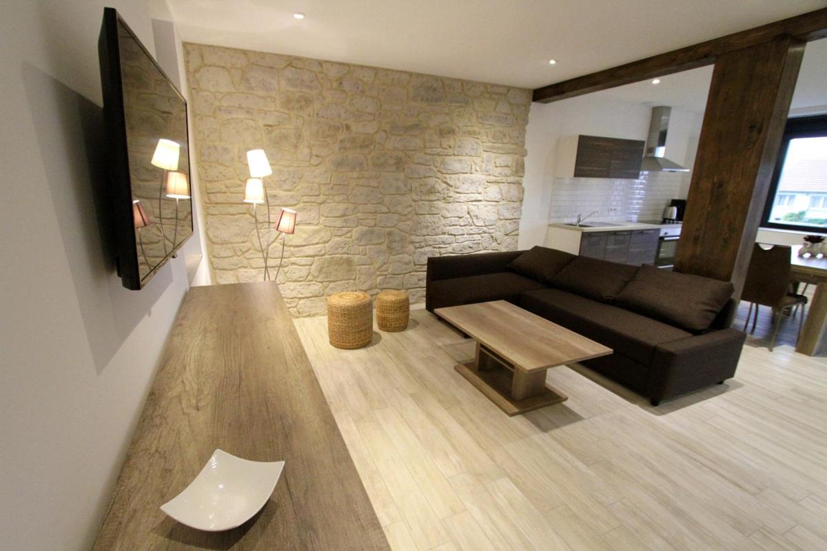Coin salon dans l'établissement Le Moulin d'Oscar & Spa - Mulhouse Nord