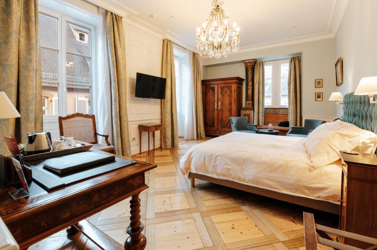 Un ou plusieurs lits dans un hébergement de l'établissement Hôtel & Spa Le Bouclier D'or