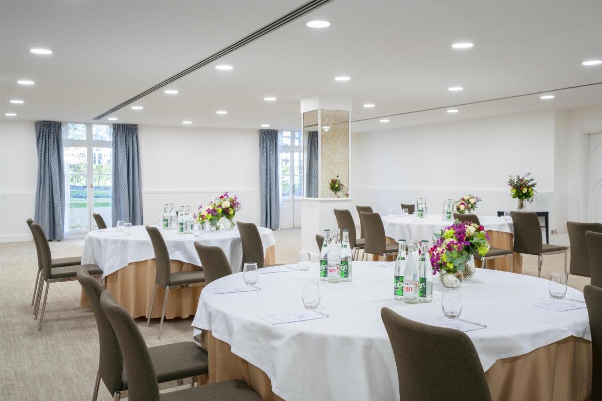 Restaurant ou autre lieu de restauration dans l'établissement Waldorf Astoria Versailles - Trianon Palace