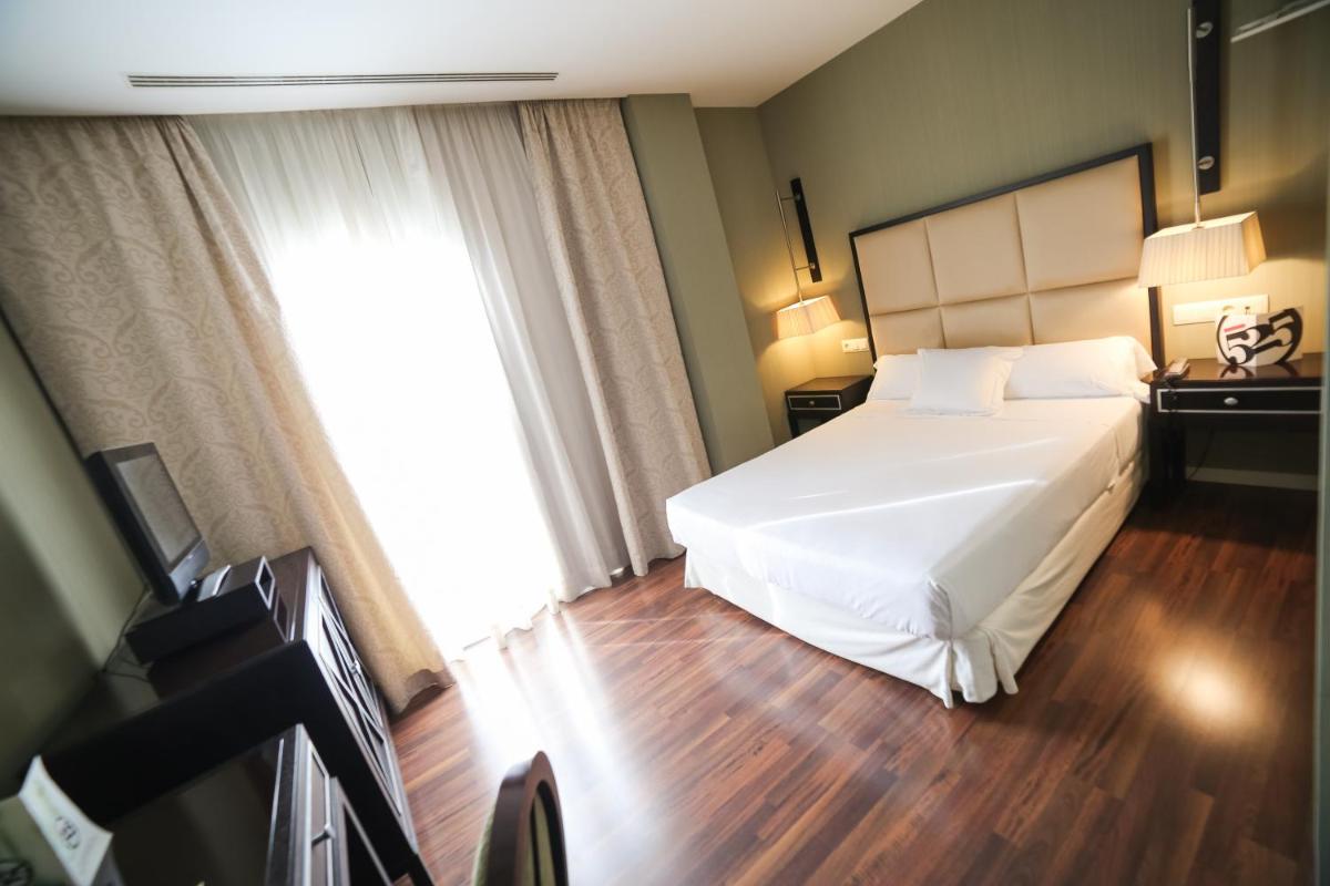 Cama o camas de una habitación en Hotel 525