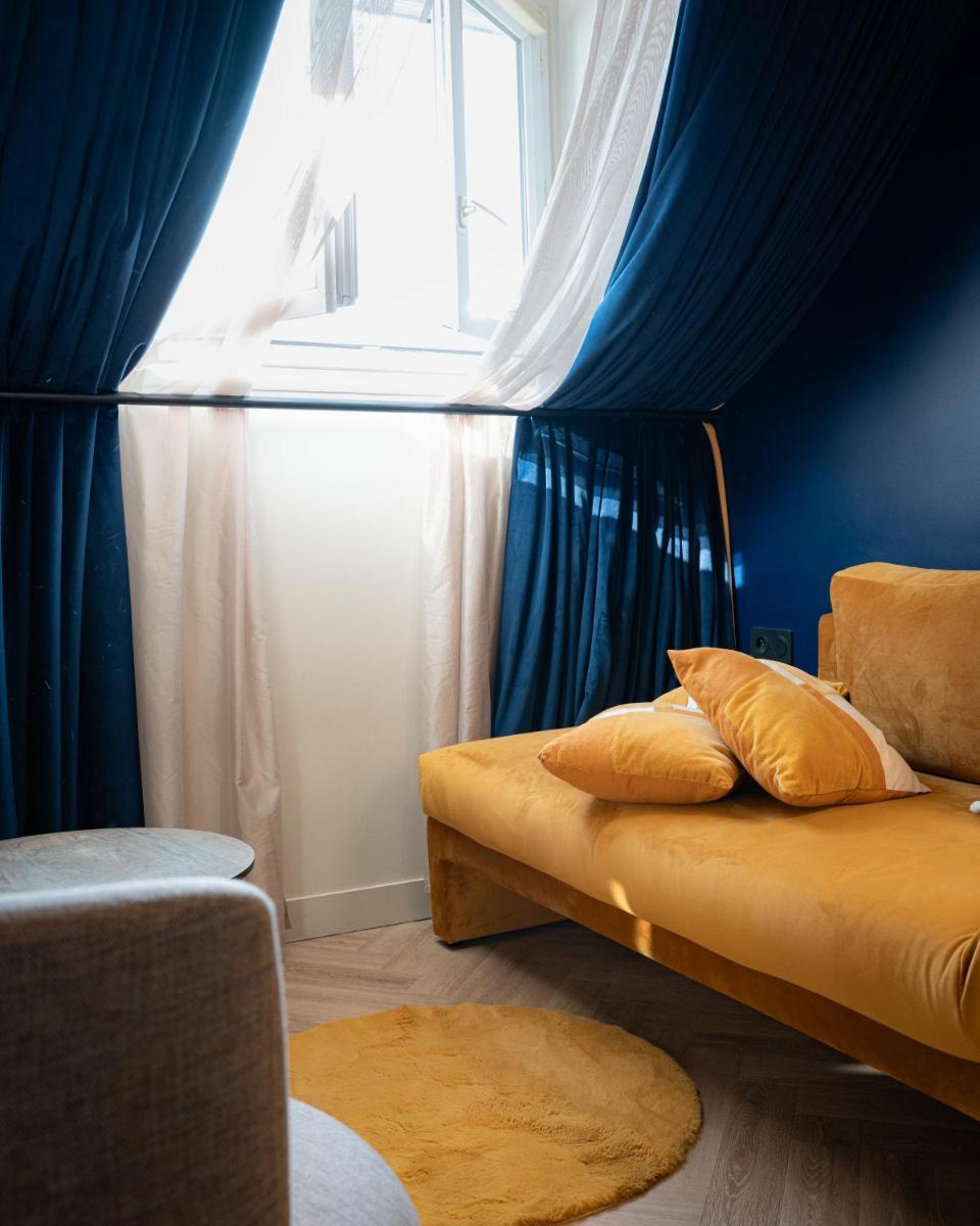 Coin salon dans l'établissement Hôtel Artemisia Montmartre