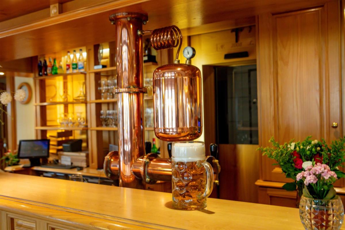 Salon ou bar de l'établissement Best Western Plus Au cheval Blanc à Mulhouse