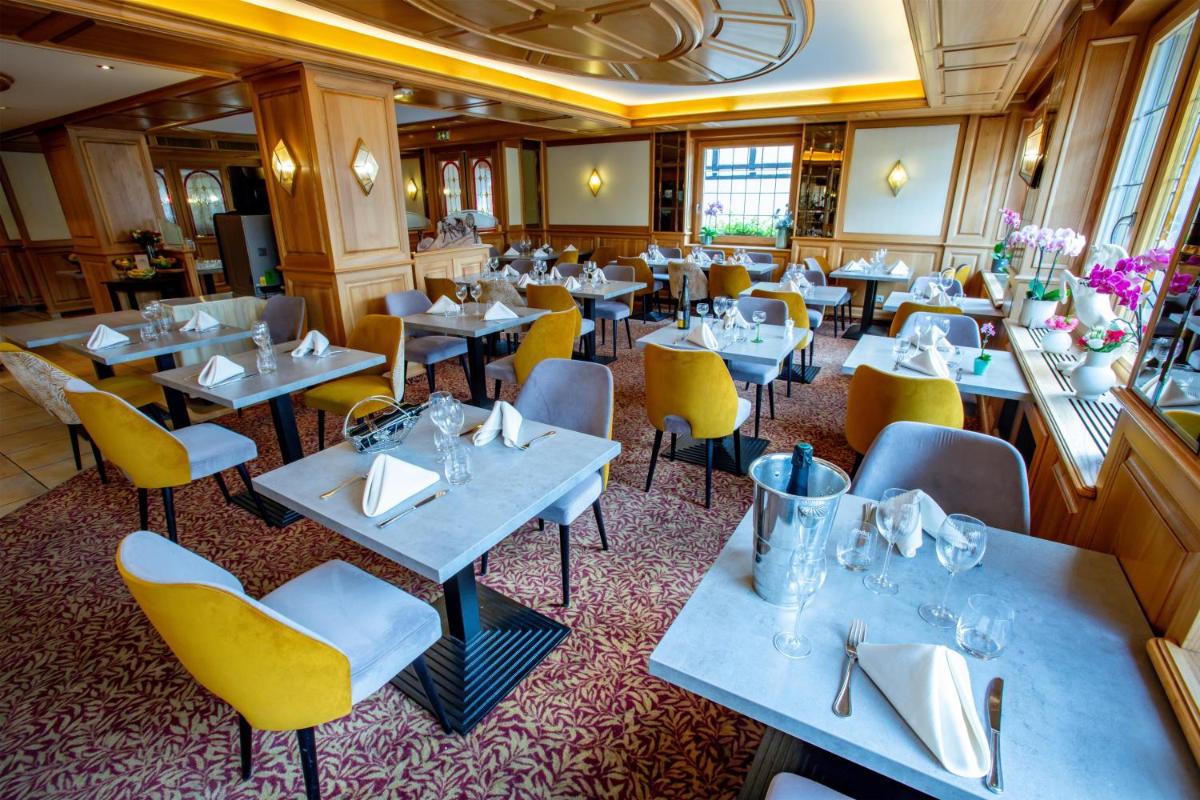 Restaurant ou autre lieu de restauration dans l'établissement Best Western Plus Au cheval Blanc à Mulhouse