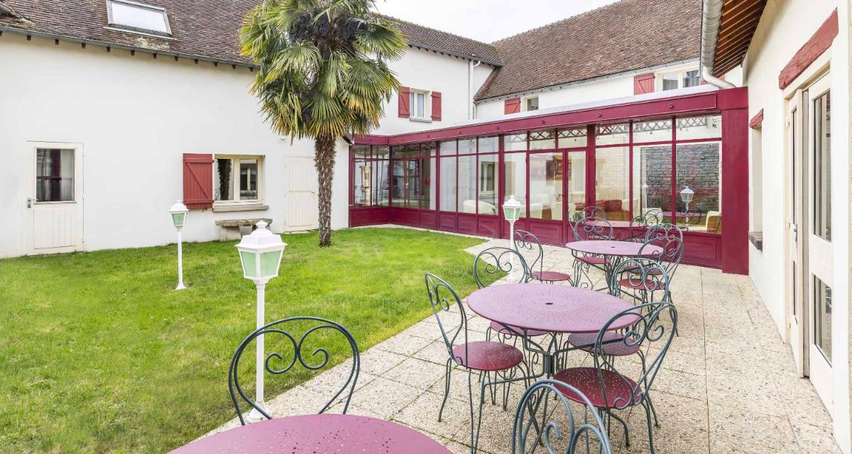 Jardin de l'établissement Auberge du Lac, Sure Hotel Collection by Best Western