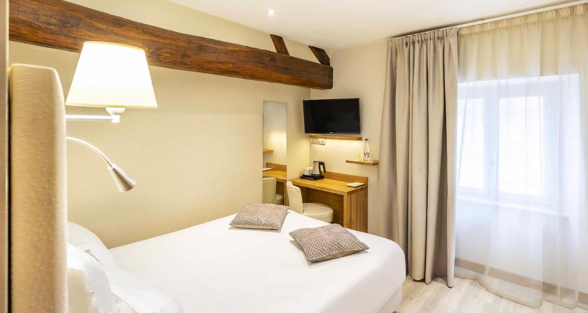 Un ou plusieurs lits dans un hébergement de l'établissement Auberge du Lac, Sure Hotel Collection by Best Western