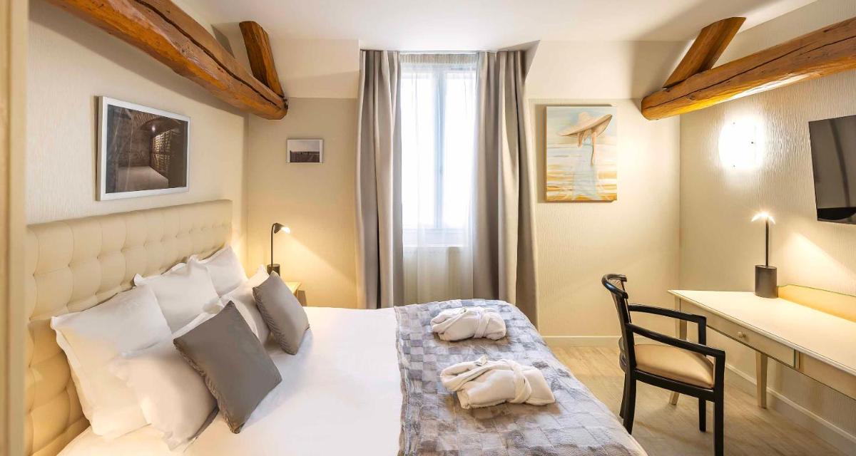 Un ou plusieurs lits dans un hébergement de l'établissement Auberge du Lac, Sure Hotel Collection by Best Western