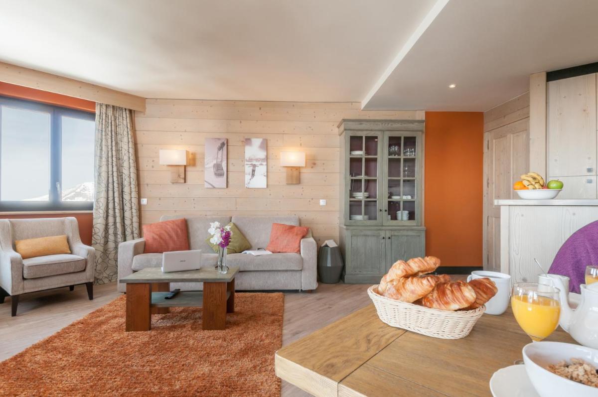 Coin salon dans l'établissement Résidence Pierre & Vacances Premium L'Amara