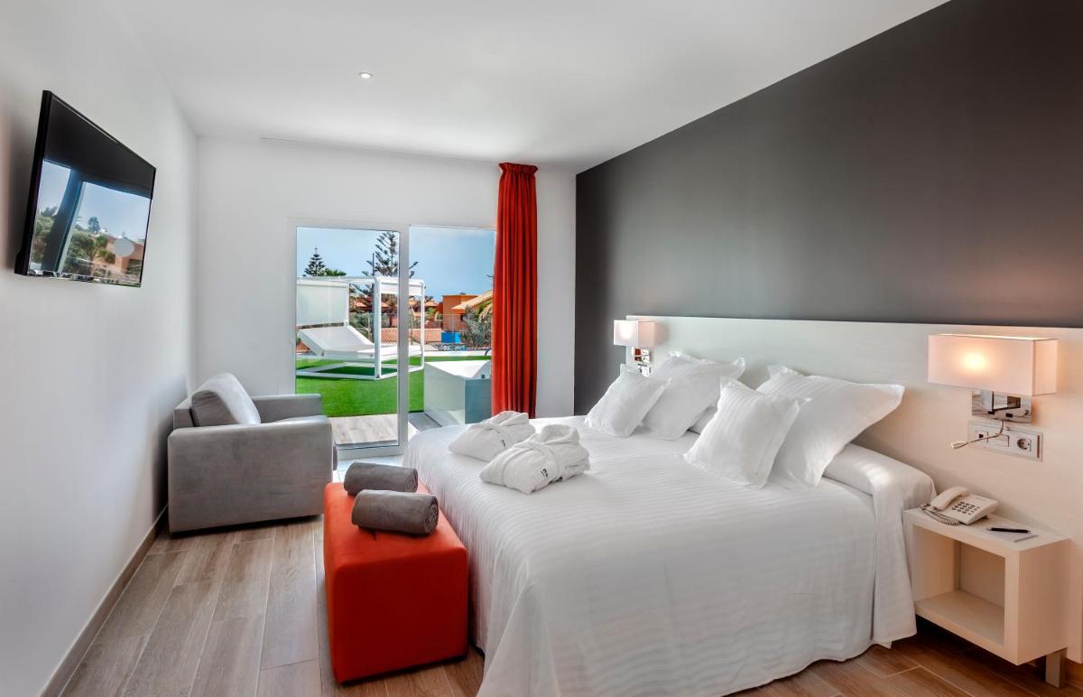 Cama o camas de una habitación en Barceló Corralejo Sands