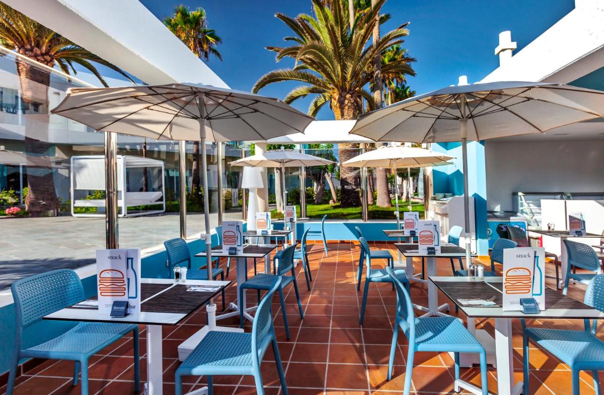 Un restaurante o sitio para comer en Barceló Corralejo Sands