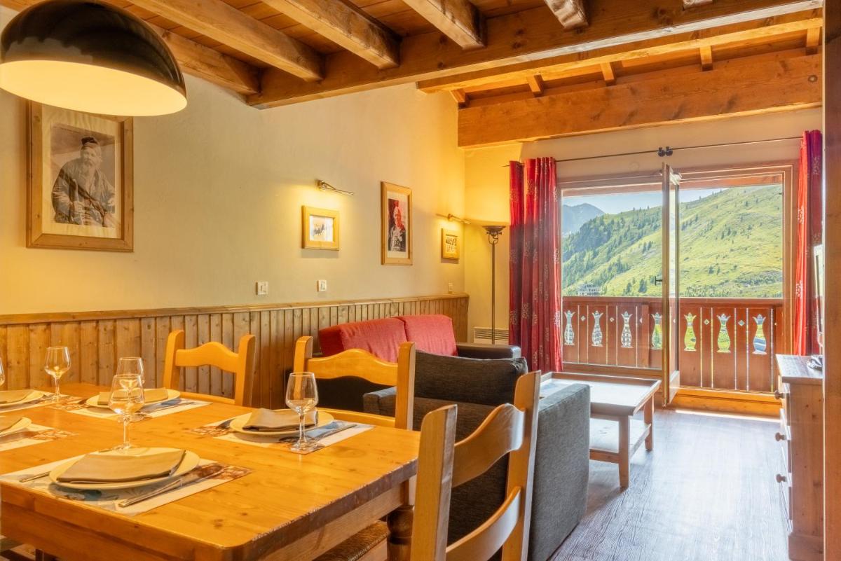 Coin salon dans l'établissement Résidences Village Montana by Les Etincelles