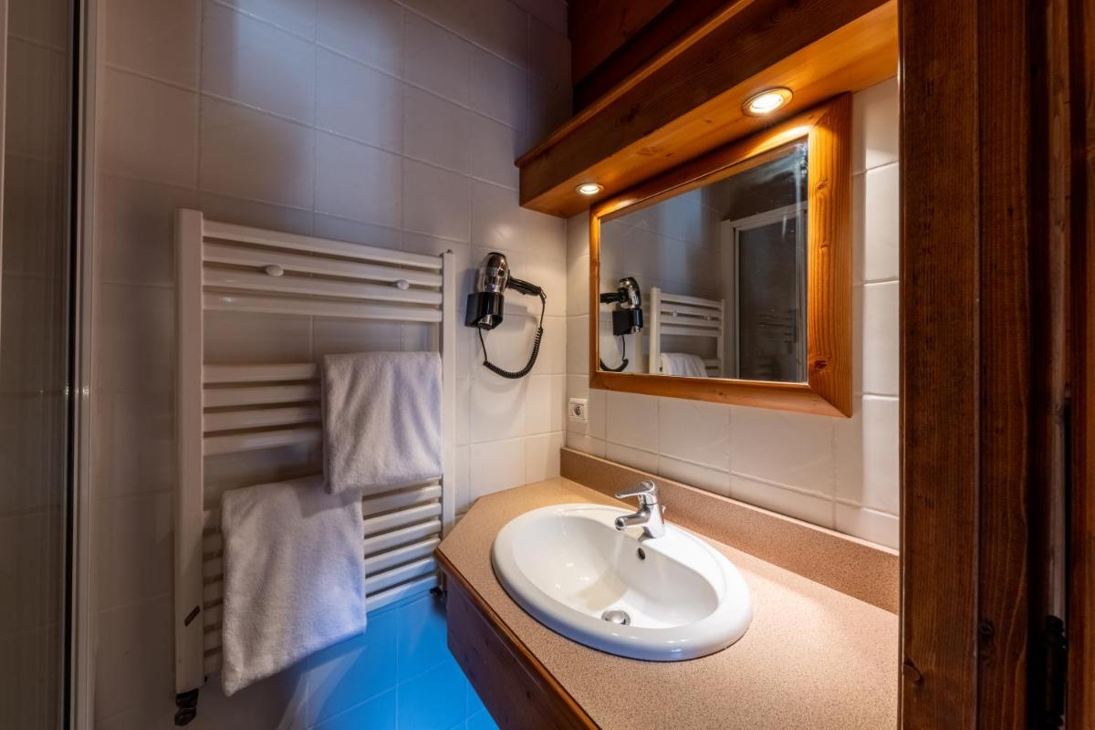 Salle de bains dans l'établissement Résidences Village Montana by Les Etincelles