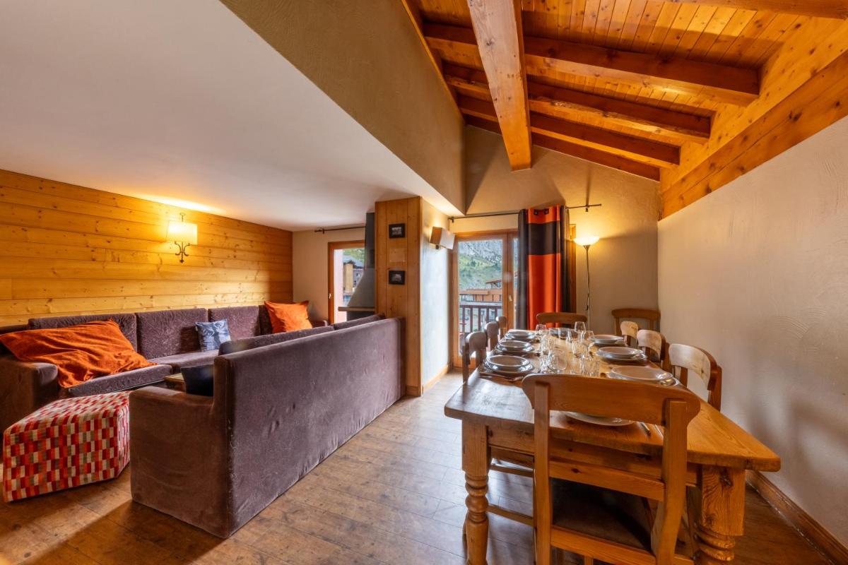 Coin salon dans l'établissement Résidences Village Montana by Les Etincelles