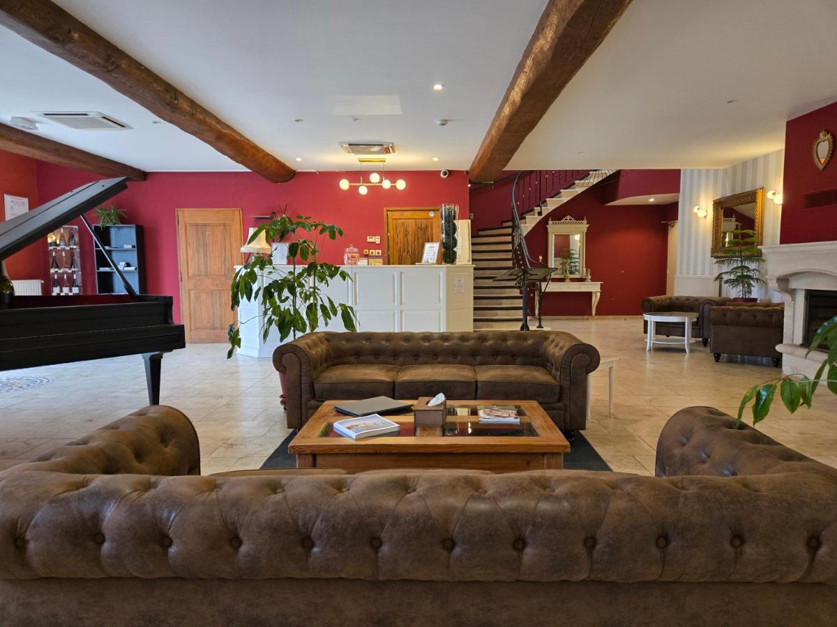 Coin salon dans l'établissement CÉRÈS - Boutique-Hôtel & Spa