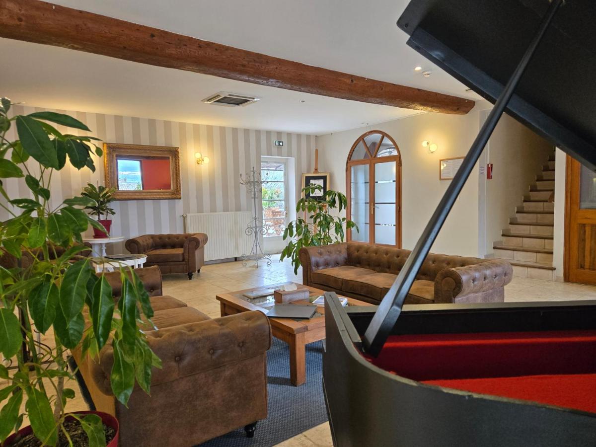 Coin salon dans l'établissement CÉRÈS - Boutique-Hôtel & Spa