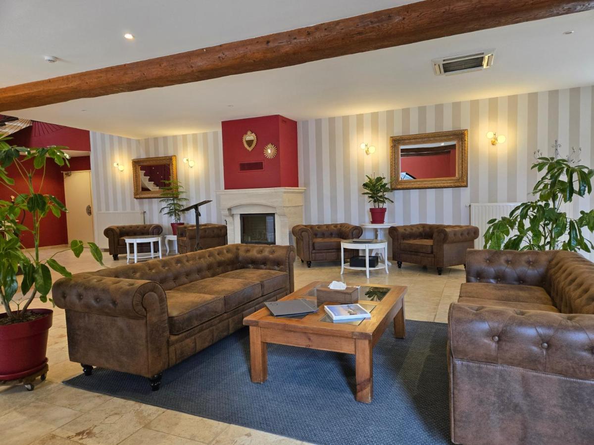 Coin salon dans l'établissement CÉRÈS - Boutique-Hôtel & Spa