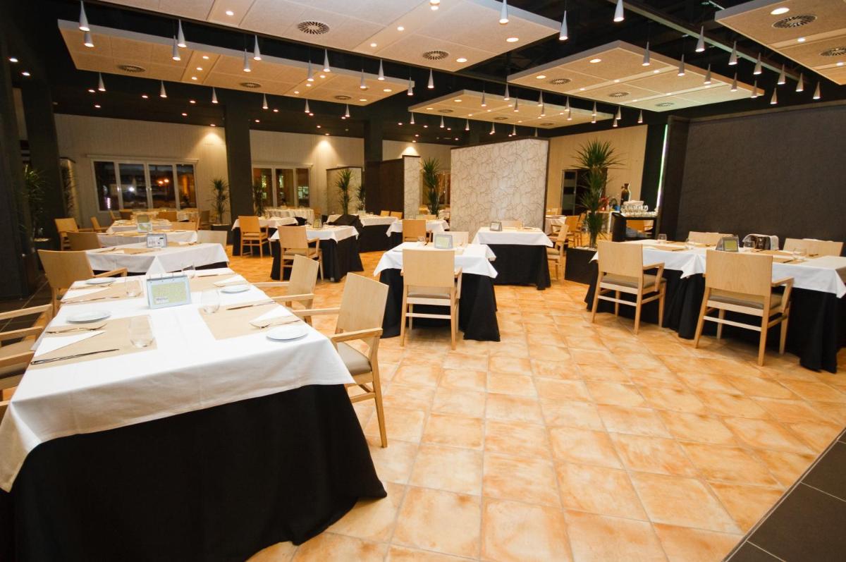 Un restaurante o sitio para comer en Alannia Costa Blanca
