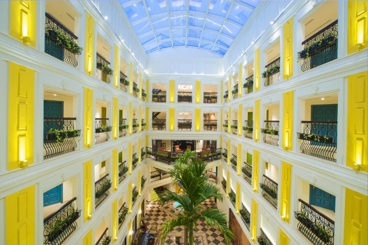 an image of the lobby of a building with a glass ceiling at Fragrant Nature Kochi - A Five star Classified Hotel in Cochin