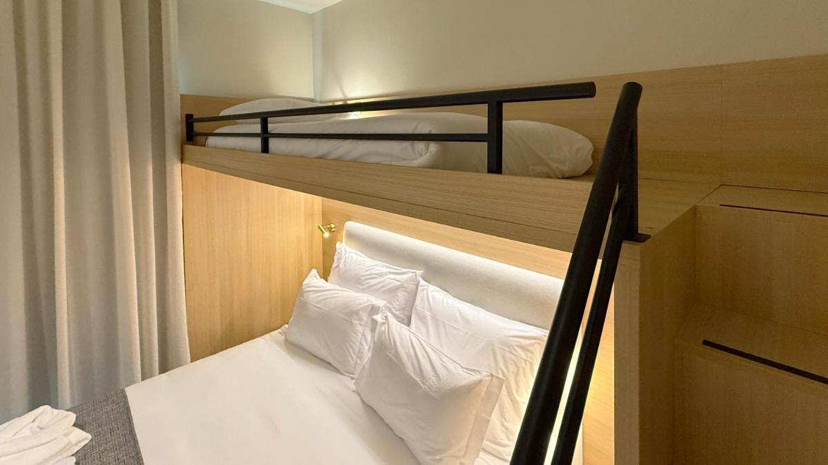 Uma cama ou camas num quarto em AP Lago Montargil - Conference & SPA