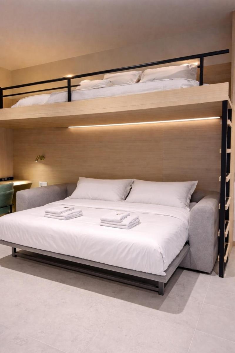 Uma cama ou camas num quarto em AP Lago Montargil - Conference & SPA