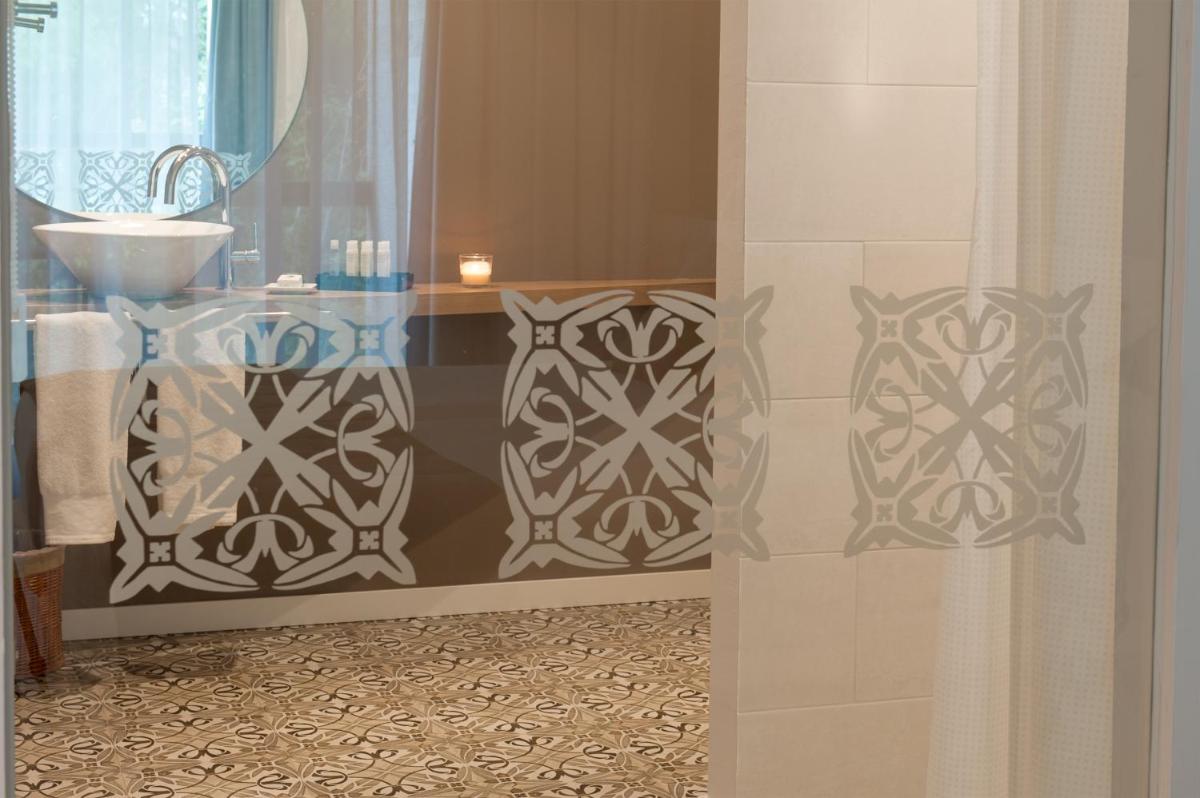 Un baño de URH - Hotel Molí del Mig