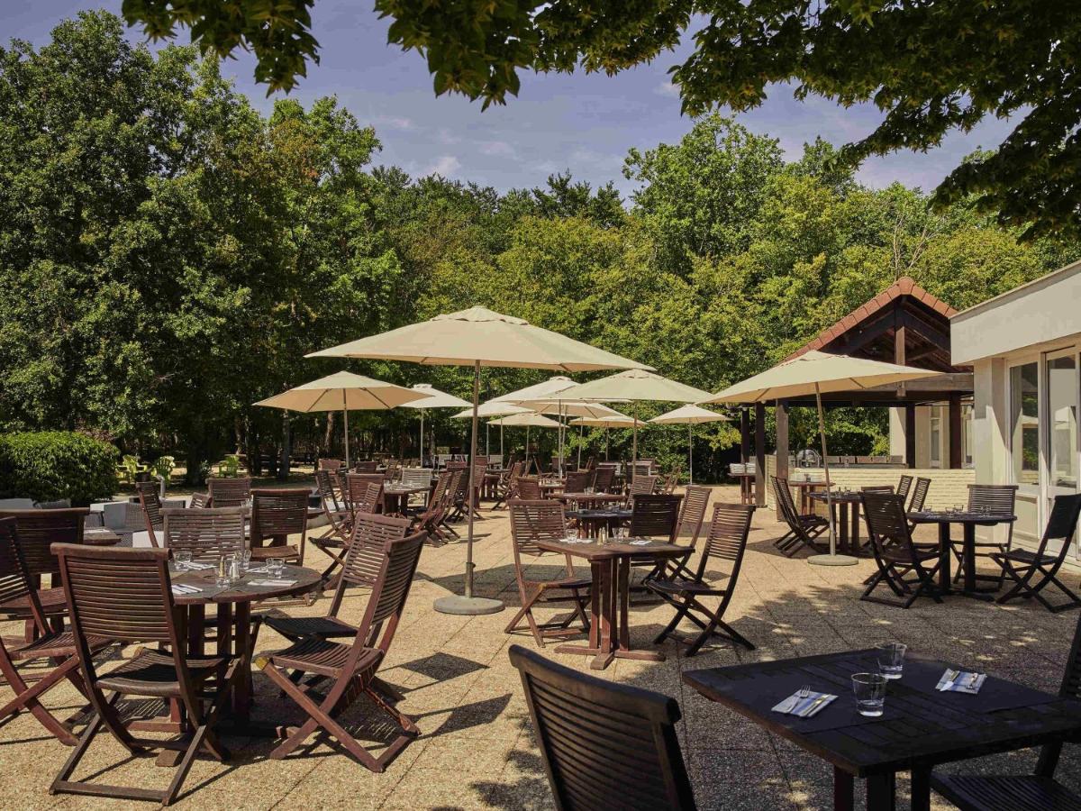 Restaurant ou autre lieu de restauration dans l'établissement Novotel Fontainebleau Ury