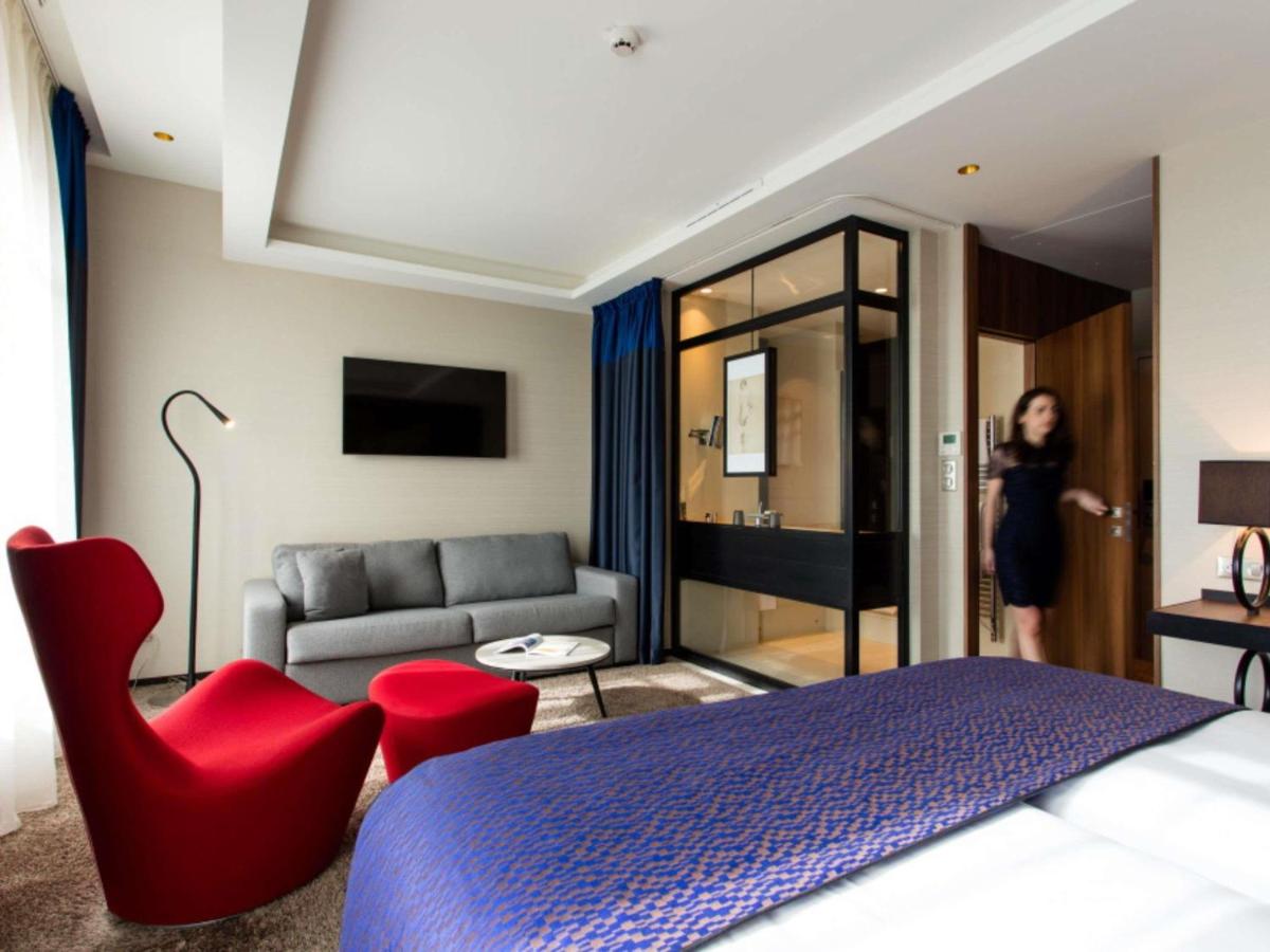 Un ou plusieurs lits dans un hébergement de l'établissement Grand Hôtel La Cloche Dijon - MGallery Collection