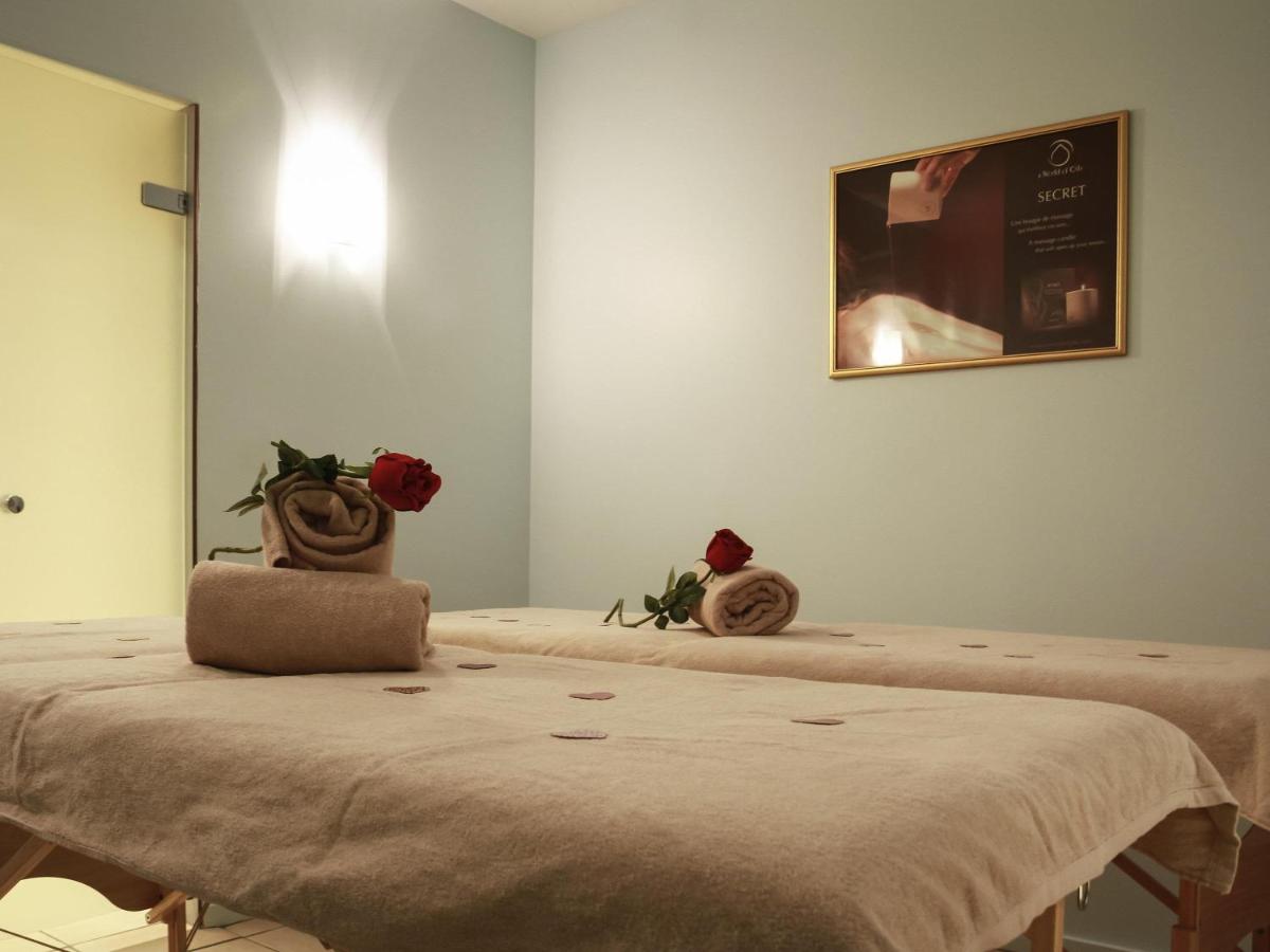 Un ou plusieurs lits dans un hébergement de l'établissement Mercure Saint Nectaire - Spa & Bien-Être