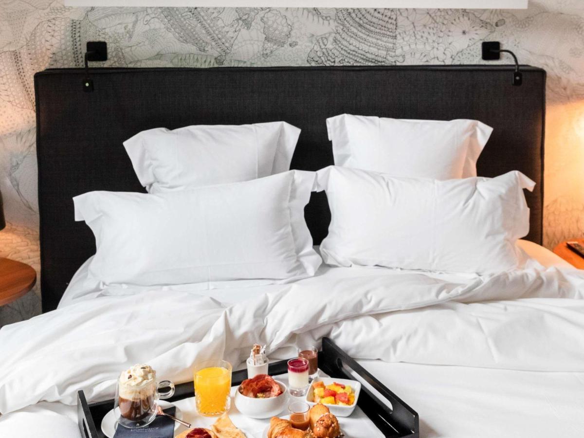 Un ou plusieurs lits dans un hébergement de l'établissement Balthazar Hotel & Spa Rennes - MGallery Collection