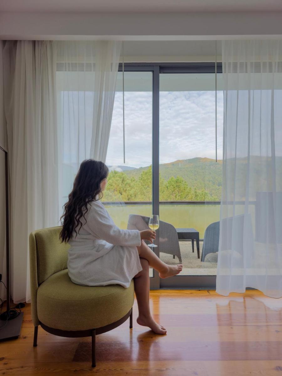 Uma área de estar em Monte Prado Hotel & Spa