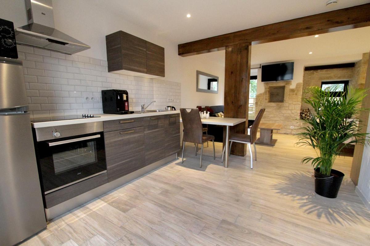 Cuisine ou kitchenette dans l'établissement Le Moulin d'Oscar & Spa - Mulhouse Nord