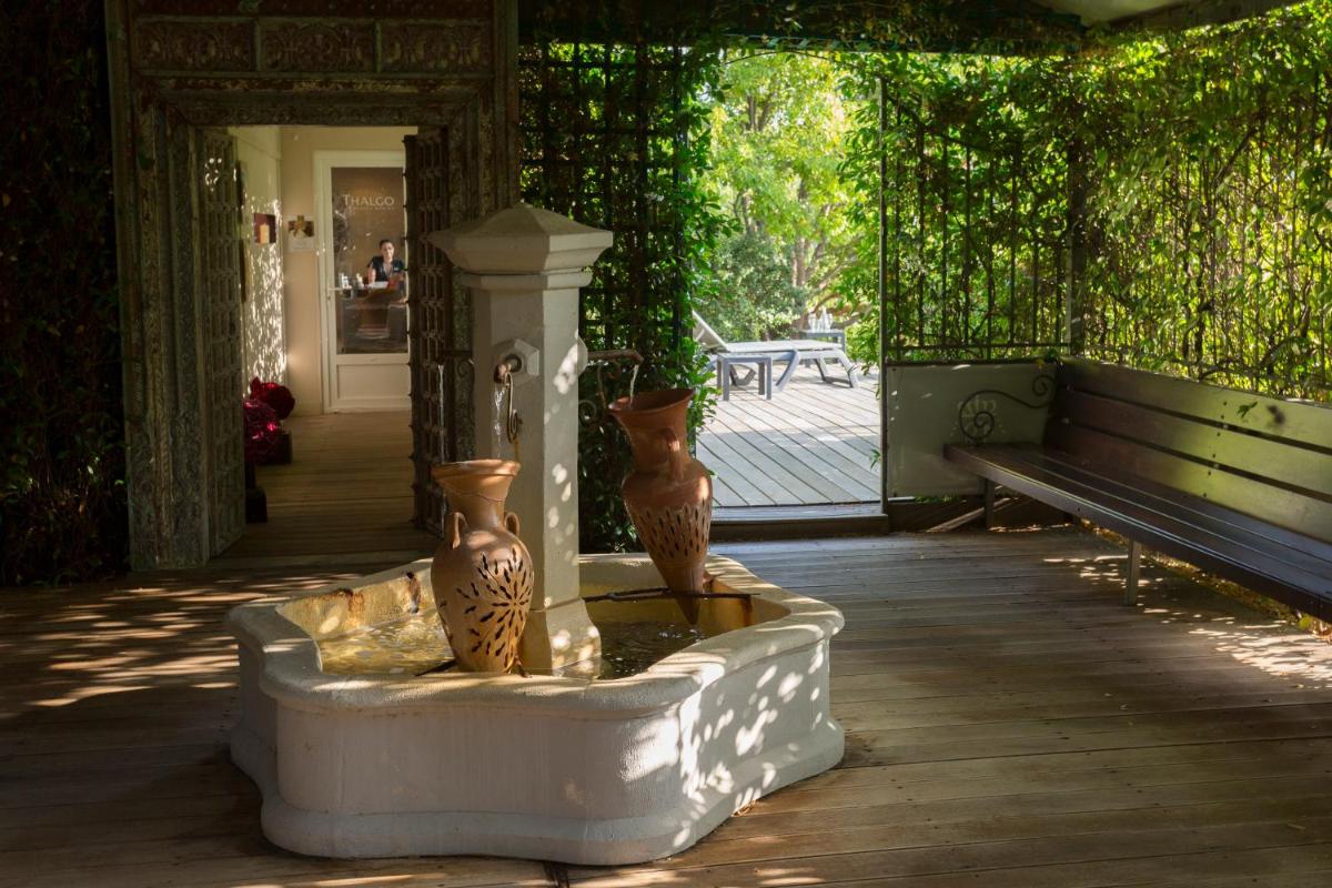 Jardin de l'établissement Hôtel Le Roi Théodore & Spa