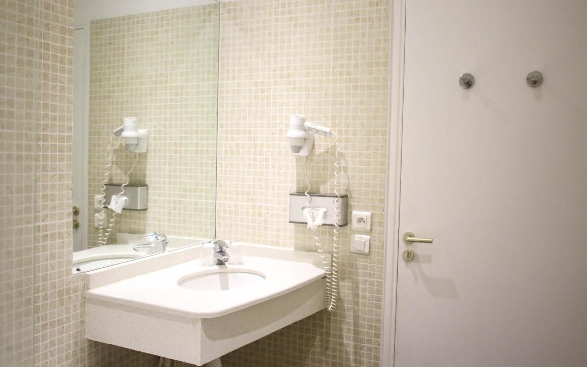 Salle de bains dans l'établissement Mercure Saint Nectaire - Spa & Bien-Être