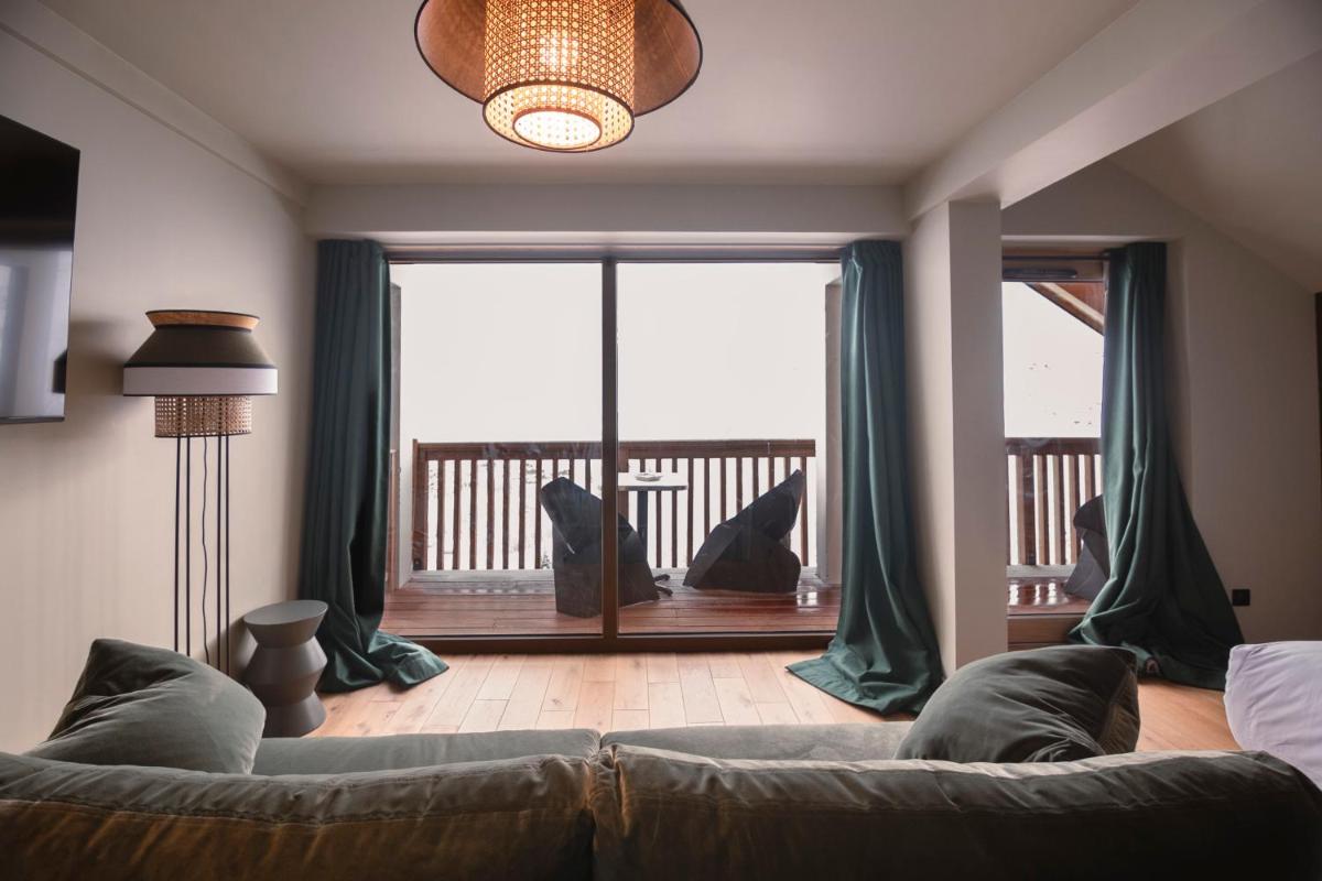 Coin salon dans l'établissement Les Cèdres - Hôtel - Restaurants - Spa