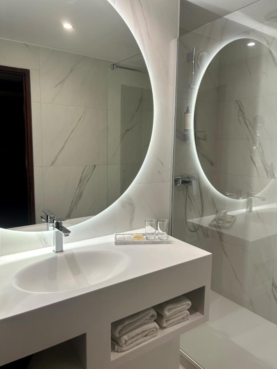 Salle de bains dans l'établissement Hotel Palladia