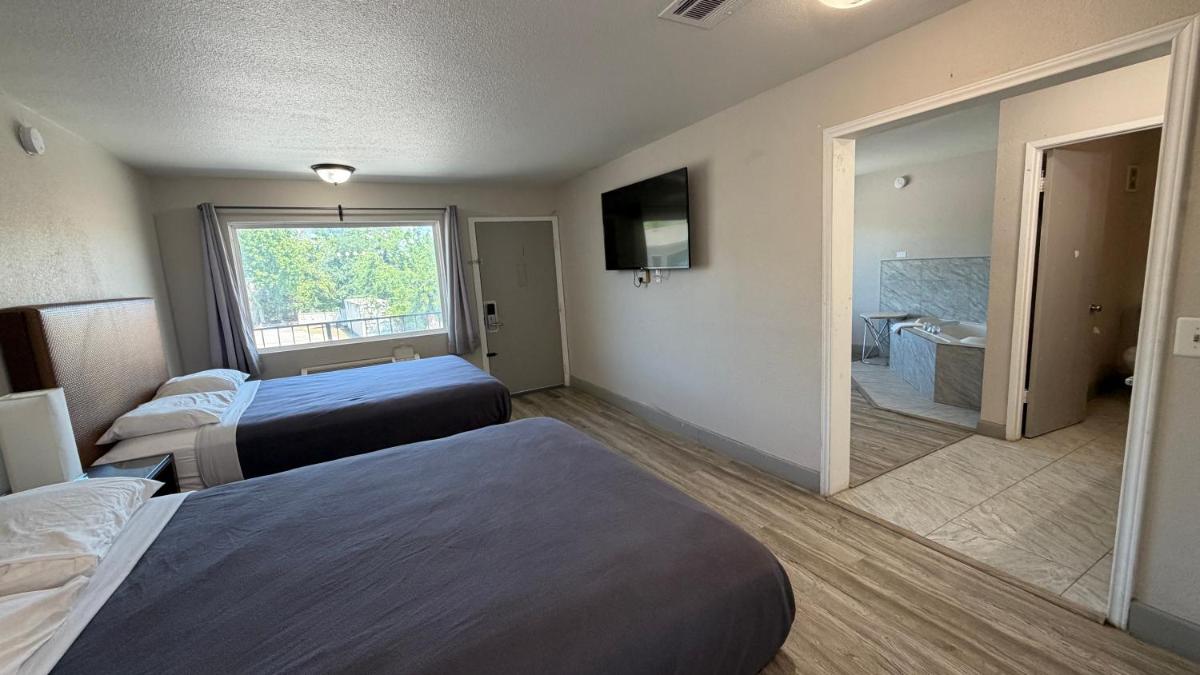 Harmony Inn and Suites - Housity