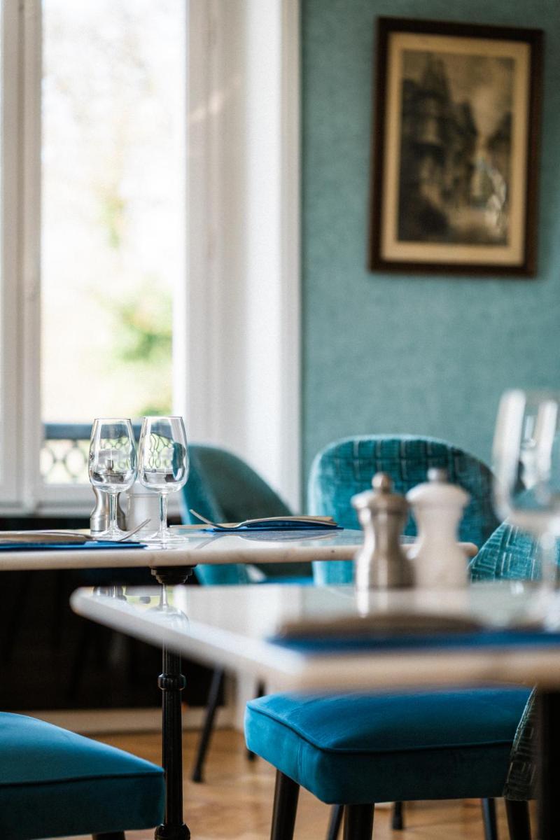 Coin salon dans l'établissement Domaine Du Roncemay - Hôtel, Restaurants, Spa & Golf