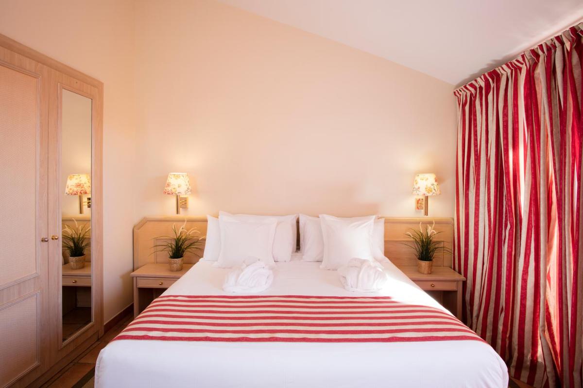 Cama o camas de una habitación en Luna Club Hotel Yoga & Spa 4Sup