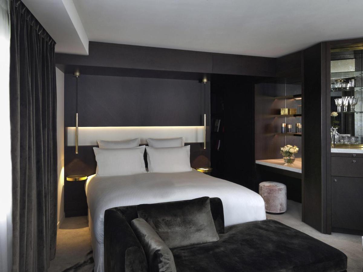 Un ou plusieurs lits dans un hébergement de l'établissement Boutet Bastille Hotel Paris - MGallery Collection