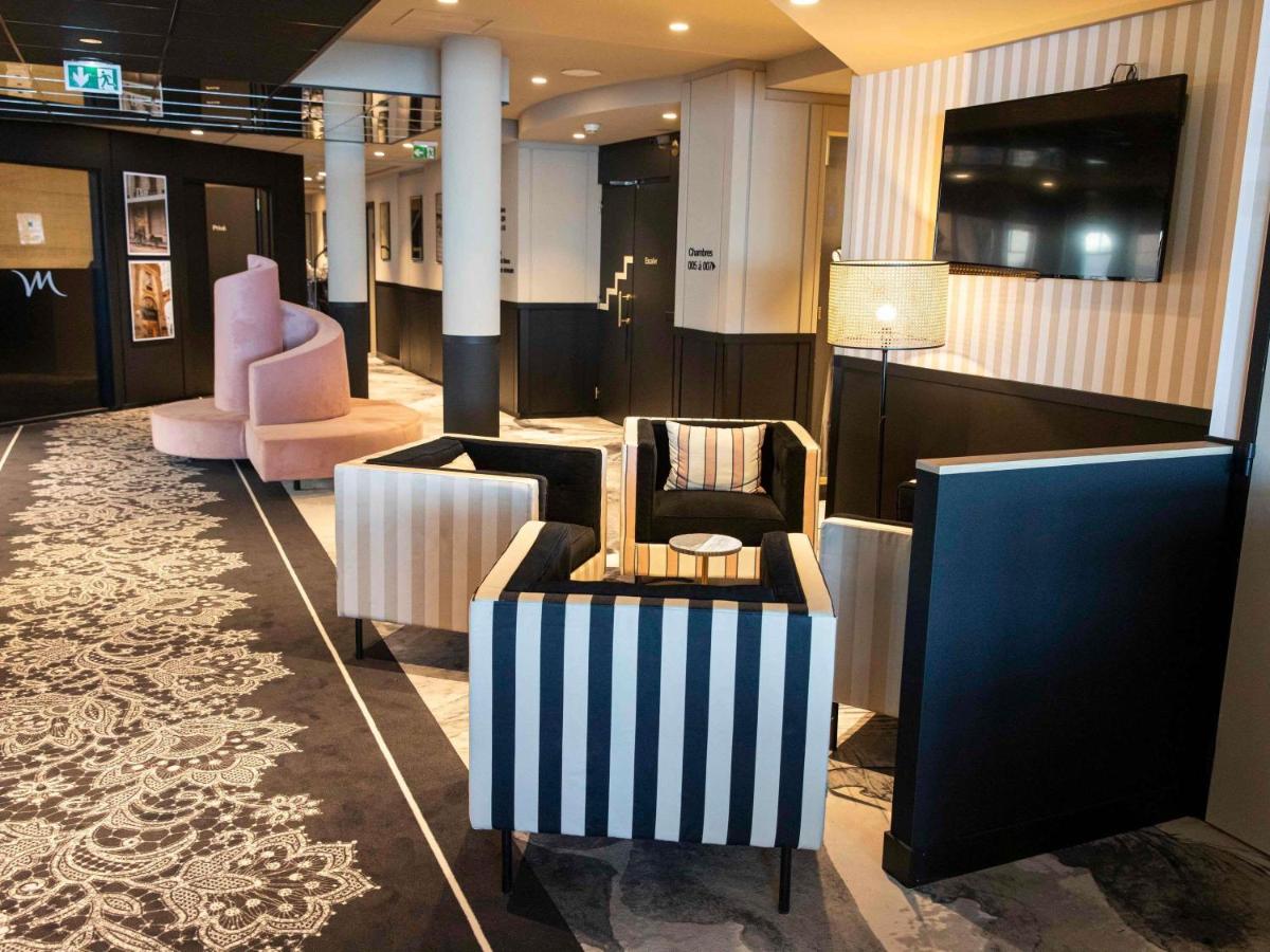Coin salon dans l'établissement Mercure Granville Le Grand Large