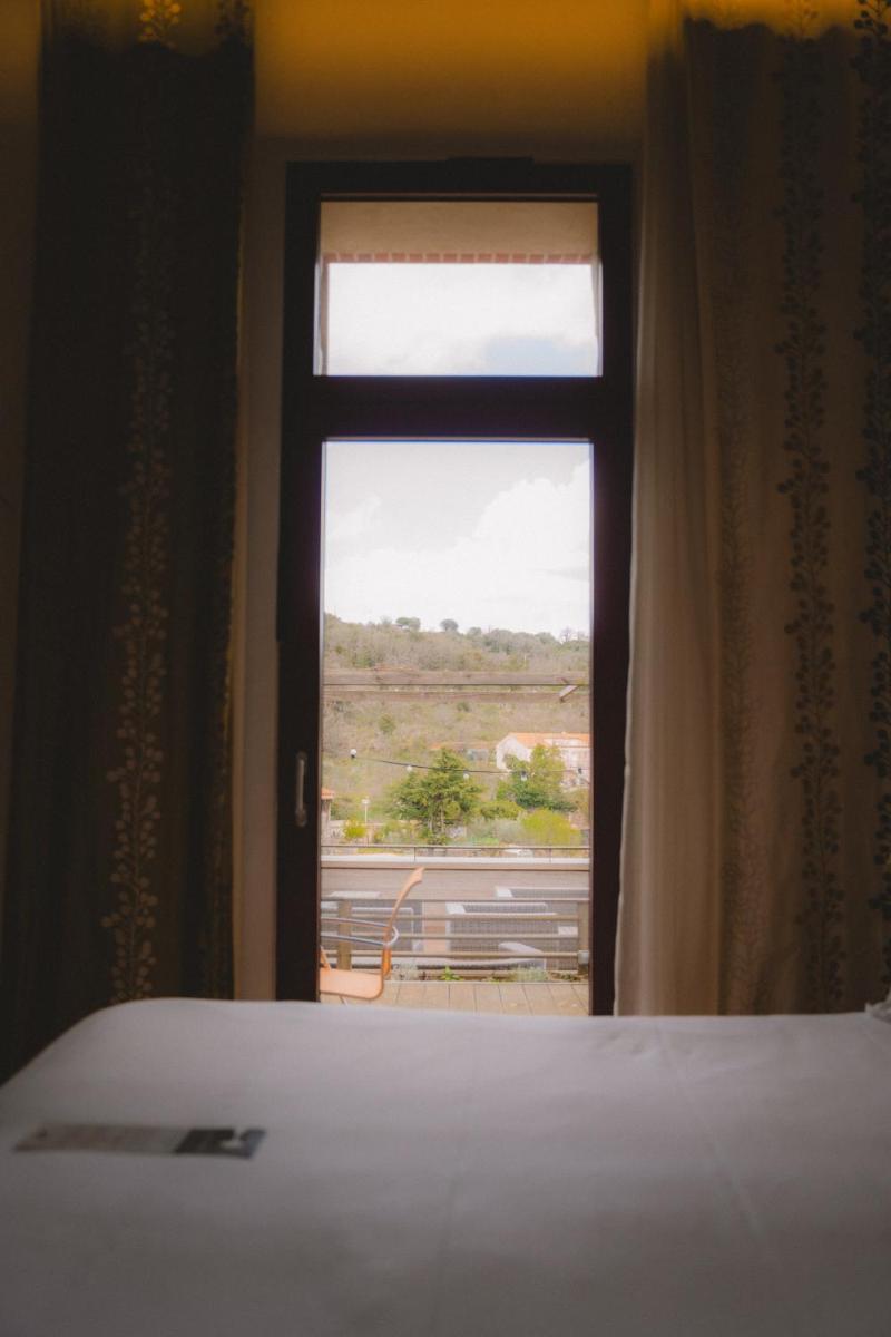Un ou plusieurs lits dans un hébergement de l'établissement Domaine Riberach - Hotel 4 - Restaurant gastronomique - Spa - Piscine - Vignoble